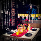 Grand anniversary celebration in Hyderabad with a beautifully decorated open terrace candle light dinner setup.