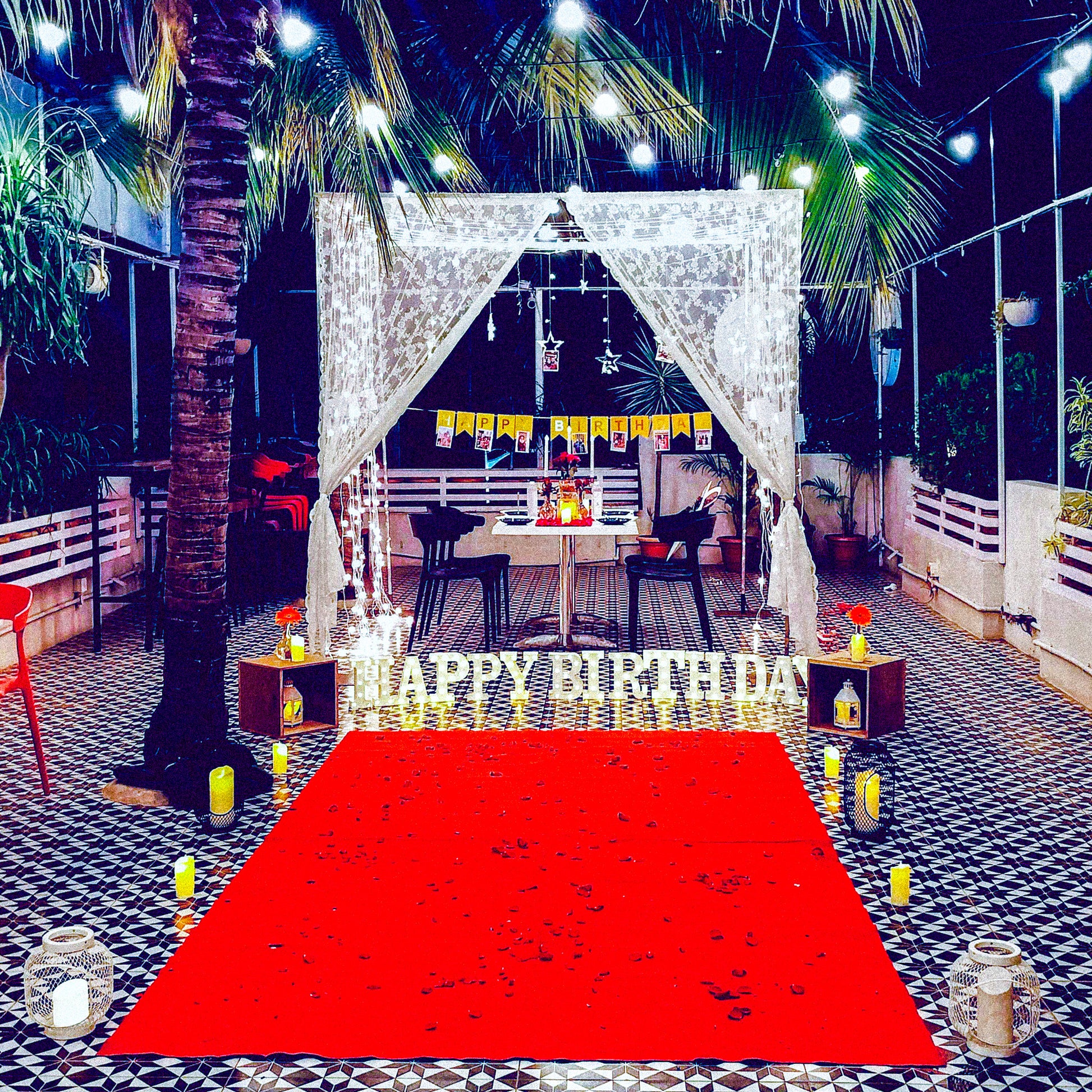 Celebrate anniversaries in Hyderabad with a grand open terrace candle light dinner and stunning decor.