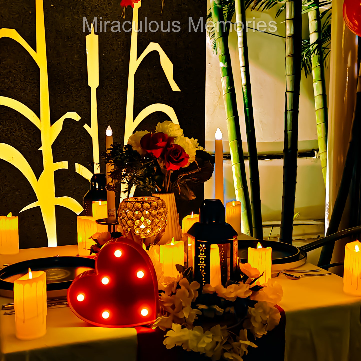 Anniversary and birthday celebration setup for couples featuring a romantic candle light dinner in Hyderabad.